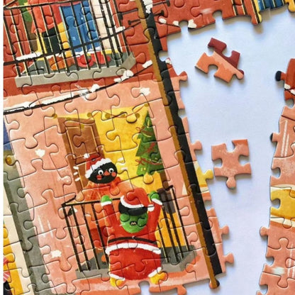 Close-up of Pinpin Blessed Night 1000 piece jigsaw puzzle showing characters in Santa outfits and festive decorations.