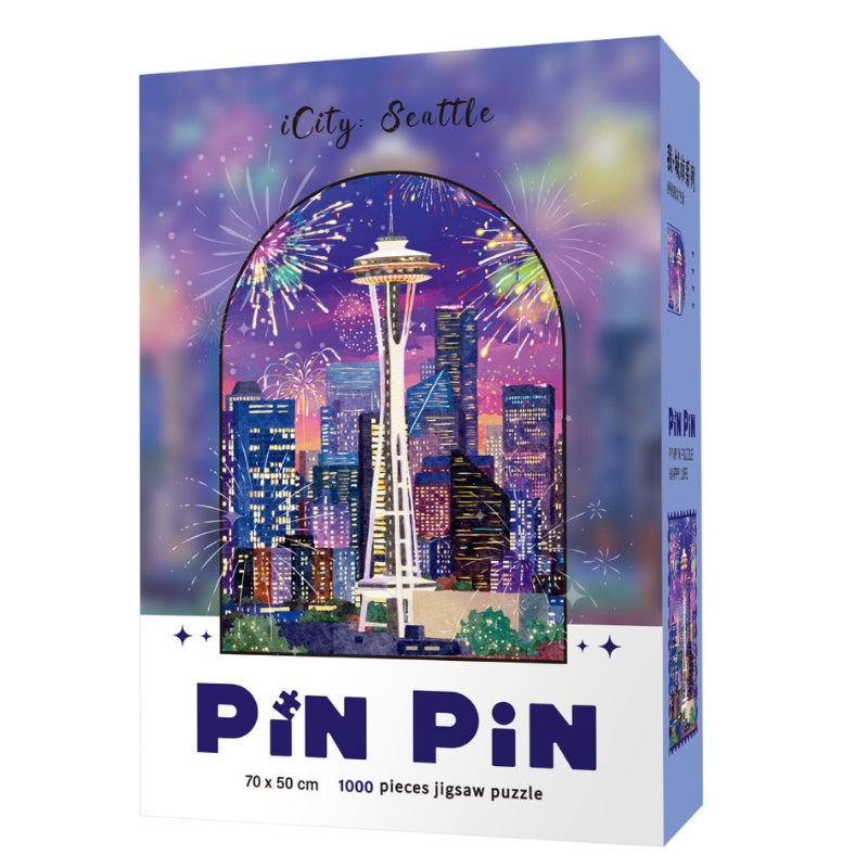 Pinpin iCity Seattle puzzle box featuring Seattle skyline with fireworks and the Space Needle, 1000 piece jigsaw puzzle.