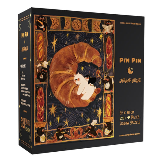 Sweet Dream 520 piece puzzle box by Pin Pin featuring a croissant with penguins and a bear under a starry night sky.