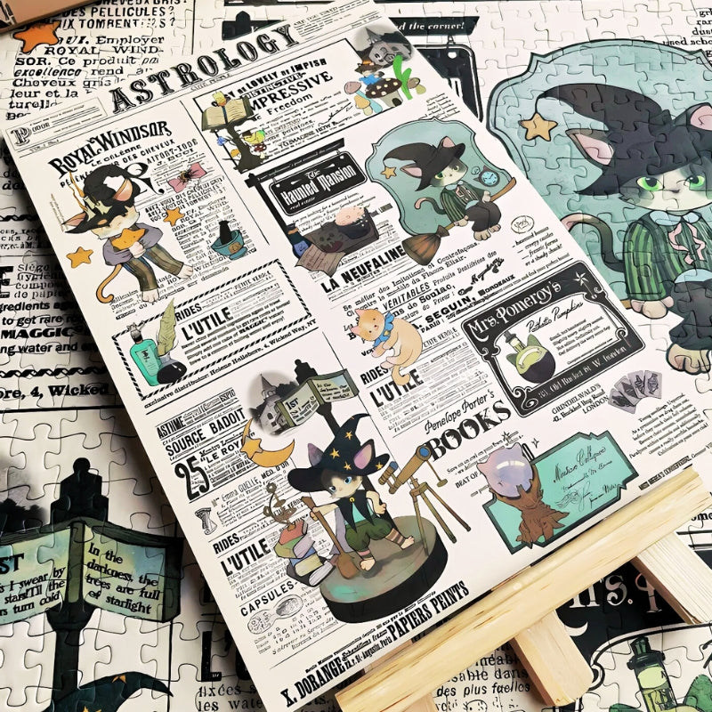 Close-up of Cat Astrology puzzle pieces assembled on a table, showing detailed illustrations of cats in astrologer costumes and vintage-style newspaper text.