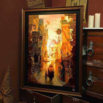 Completed Harry Potter-Diagon Alley puzzle framed and displayed on a wooden table.