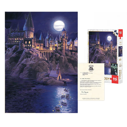 Flat lay of full Hogwarts Castle puzzle set with box, completed puzzle and Hogwarts letter.