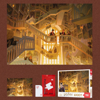 Harry Potter - Hogwarts Grand Staircase puzzle set flat lay with completed puzzle, red TOI box, and glue packet.