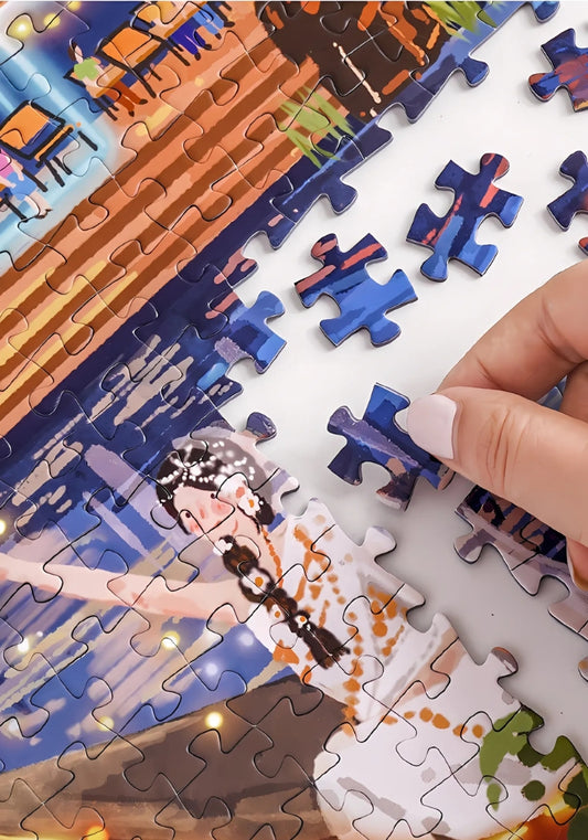 Hand placing a puzzle piece into the Moonlit Bazaar scene, showing water and boat details.
