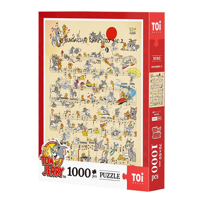 Tom and Jerry Hungarian Rhapsody No. 2 1000-piece puzzle box by TOI with musical score and cartoon scenes.
