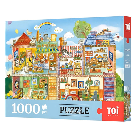 Front of TOI's Café Paws & Whiskers 1000-piece puzzle box featuring a lively cat café illustration.