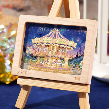 Completed Starlit Carousel puzzle displayed in a mini wooden easel frame.