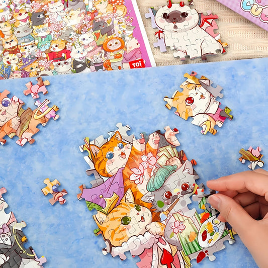Close-up of puzzle pieces showing a panda and orange tabby cat surrounded by cherry blossoms.