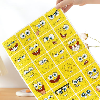 Completed TOI 300 piece puzzle held up showing SpongeBob SquarePants in a range of silly and fun moods