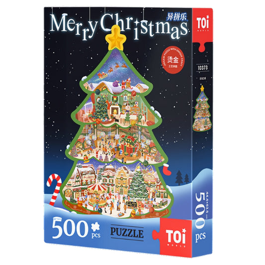 Christmas Town puzzle box by TOI featuring a 500-piece embossed gold foil tree-shaped design with festive scenes.