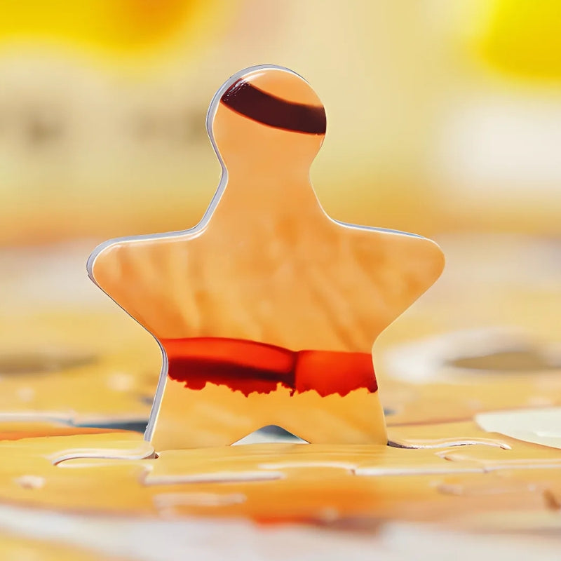 Unique shaped puzzle piece from the Sweet Time set, with orange and red tones.
