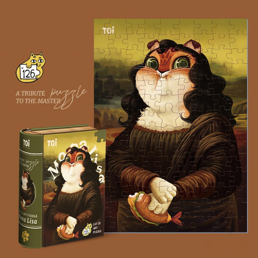 Completed Cat Art Puzzle – Mona Lisa by TOI, featuring a cat parody holding a fish burger with book-style box.