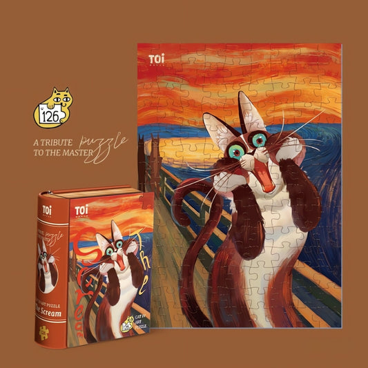 Completed Cat Art Puzzle – The Scream by TOI, featuring a wide-eyed cat parodying the iconic artwork, shown with its book-sty