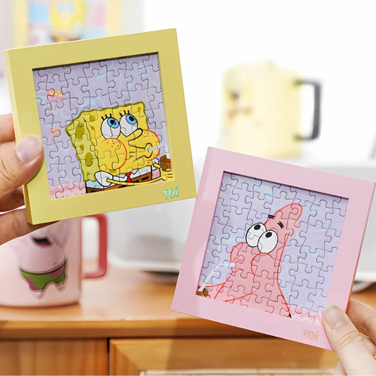 Hands holding finished mini puzzles of SpongeBob and Patrick in frames from the surprise set.
