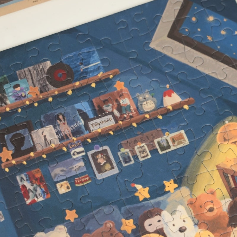 Puzzle detail highlighting shelves of books, photos, and glowing star decorations.