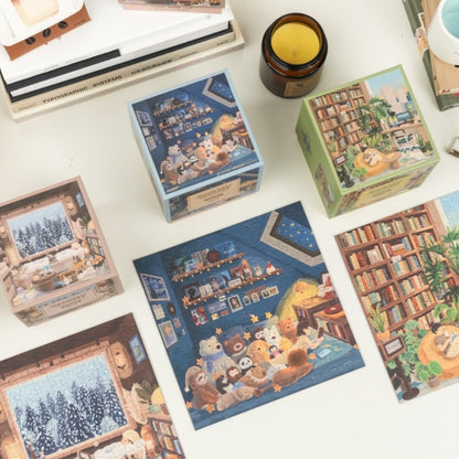 Flat lay showing Star Attic, Snowy Cabin, and Natural Room mini puzzles with boxes.